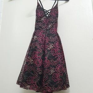 Sleeveless rose and gold embroidered black dress